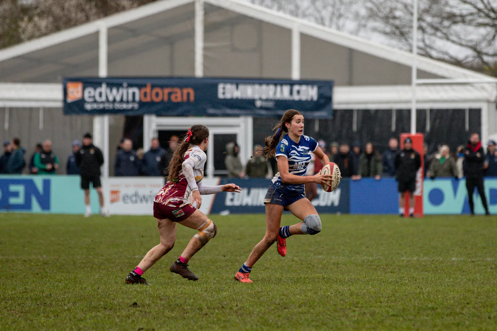 Detail of the JESS Dubai rugby kit featuring J20 Sports performance branding during international competition.