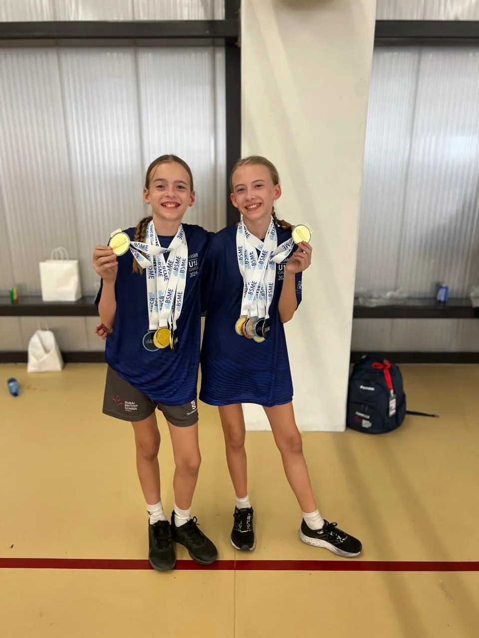 Sophia and Isabella of DBS Jumeirah celebrating their BSME Athletics win in Muscat.