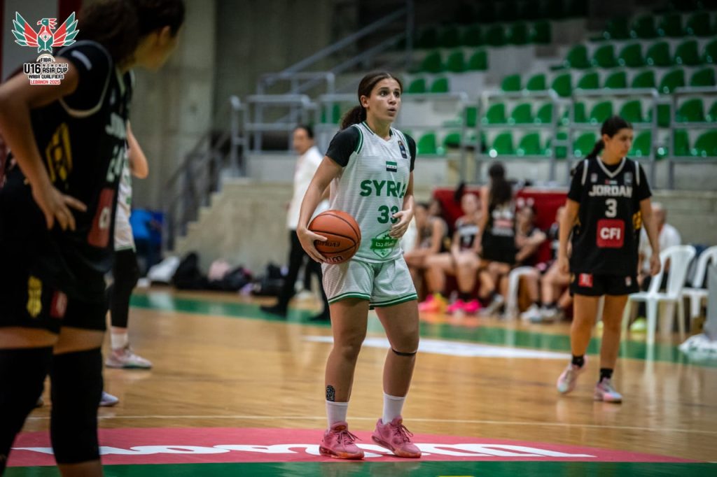 Raya shooting free throw in basketball game